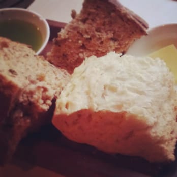 The Outsider - Yummy crusty bread with basil oil and butter - Modern European Near Me - Edinburgh, EDH The Outsider - Yummy crusty bread with basil oil and butter - Modern European Near Me - Edinburgh, EDH