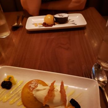Scarpetta - Olive oil cake (foreground), valrhona chocolate cake (background) - Italian Near Me - New York, New York