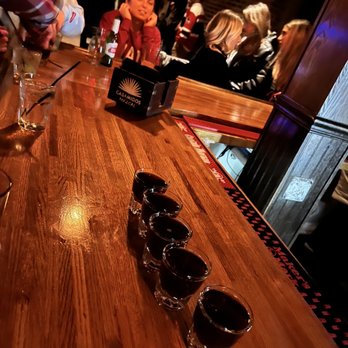 The O Pub - a man pouring a glass of wine - Pubs Near Me - Oxford, Ohio The O Pub - a man pouring a glass of wine - Pubs Near Me - Oxford, Ohio