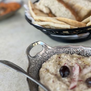 Sultana Mediterranean - a bowl of hummus and pita chips - Turkish Near Me - Menlo Park, California Sultana Mediterranean - a bowl of hummus and pita chips - Turkish Near Me - Menlo Park, California