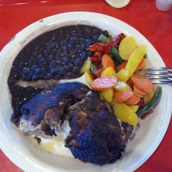 Inka Chicken - The half chicken (with a bite out already), beans and veggies. Delicious! - Peruvian Near Me - Austin, Texas Inka Chicken - The half chicken (with a bite out already), beans and veggies. Delicious! - Peruvian Near Me - Austin, Texas