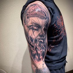 Satori Ink - Black and Grey Realism half sleeve arm tattoo by Shaun Washburn