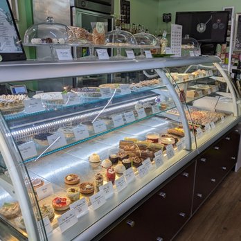 Macarons & Goodies - a display case with a variety of baked goods - Bakeries Near Me - St. Albert, Alberta