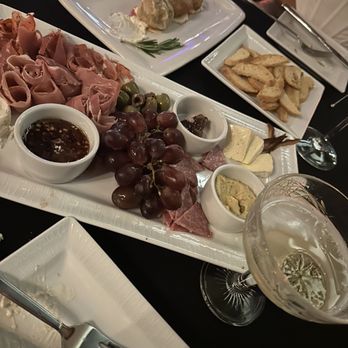 Circle Of 5ths - a platter of meat and cheeses - Tapas/Small Plates Near Me - Akron, Ohio
