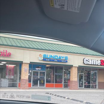 Sundays Sun Spa Wellness - Entrance that looks permanently closed, between GameStop & T-Mobile. - Spray Tanning Near Me - Norfolk, Virginia