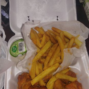 Wing's House - chicken wings and french fries in a styrofoam container - Chicken Wings Near Me - Decatur, Georgia Wing's House - chicken wings and french fries in a styrofoam container - Chicken Wings Near Me - Decatur, Georgia