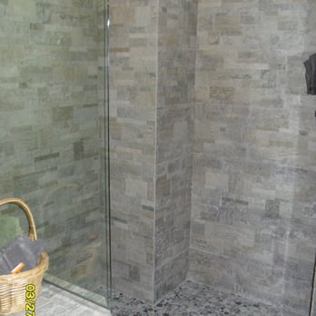 Denson Construction Services - Master bathroom renovation - After - Installed marble tile on the floors, pebble stone on the shower floors, & slate tile on the walls - General Contractors Near Me - Detroit, Michigan