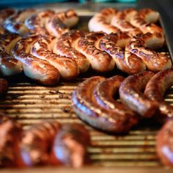 STERNEN GRILL - Sausages cooking on the grill