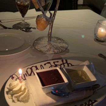 Steak 44 - Beignets tree dessert with dipping sauces- chocolate and possibly vanilla? Yummy either way! - Steakhouses Near Me - Phoenix, Arizona