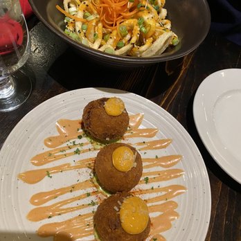 Travesias - Arancini (front) and calamari (back) - Latin American Near Me - Bronx, New York