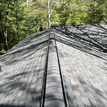 Fives Contracting - the roof of a house with a shingled roof - General Contractors Near Me - Medford, New Jersey