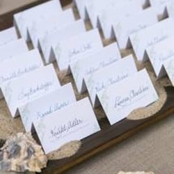 Letterpress escort cards custom designed by Nessa Sander.