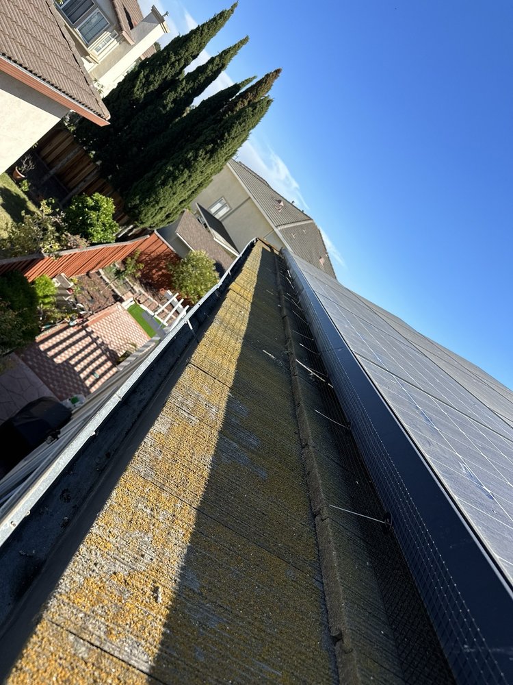 Slide of LAAC Roofing Services