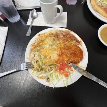 Weck's - Chicken Burrito (Christmas: 1/2 green and 1/2 red chile sauce), side of beans and hash browns - Breakfast & Brunch Near Me - Las Cruces, New Mexico