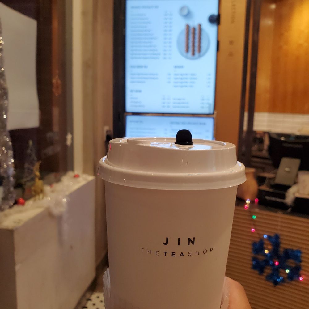 Jin Tea Shop - Ginger Milk Tea with odd, uneven 3 plastic contraption cup holder - Tea Rooms Near Me - Pasadena, California