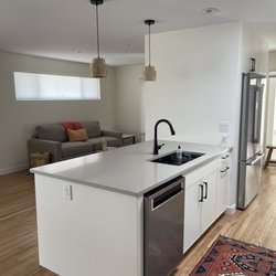 Forward Architecture - Finished Photo of kitchen & living room in full house mid century modern remodel in Denver, CO