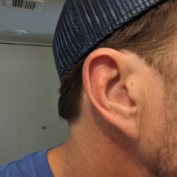 Electric Haven - Asked for 1/2" off of the 3+ that was hanging over my ear. Made it explicitly clear several times and he cut it all off anyway.