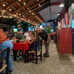 Besame Mucho - The owner seeming one of the tables