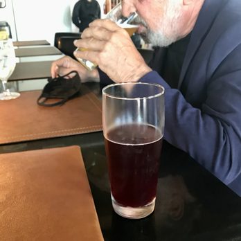 Chez Bacchus - Refreshing Lindeman Framboise. Had if not been on their beer list I'd not have guessed. (No one in this photo is inebriated). - New American Near Me - Long Beach, California Chez Bacchus - Refreshing Lindeman Framboise. Had if not been on their beer list I'd not have guessed. (No one in this photo is inebriated). - New American Near Me - Long Beach, California
