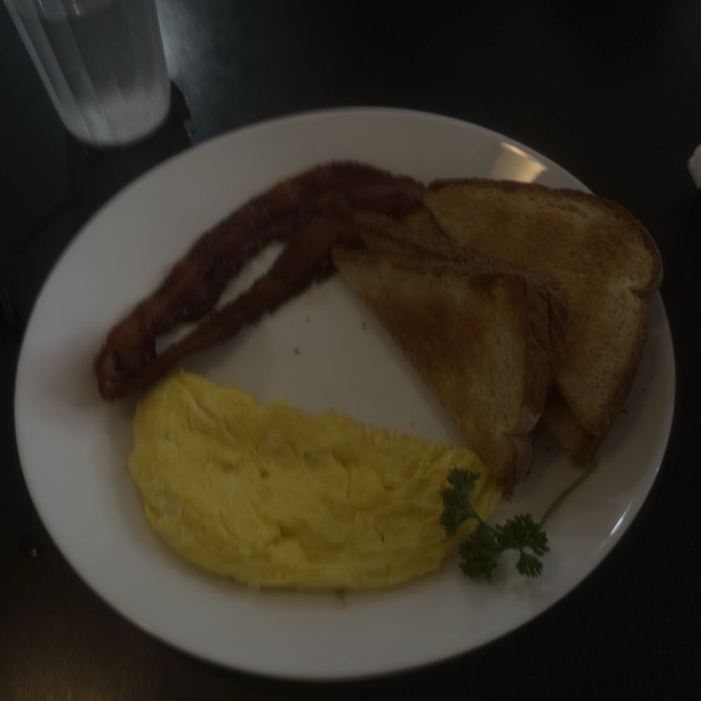 Lefse Lodge Kafe - A traditional breakfast of scrambled eggs, toast, and bacon. - Scandinavian Near Me - Decorah, Iowa