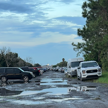 Global Airport Parking - Huge water filled holes that I had to walk thru to get to my car - Parking Near Me - Margate, Florida