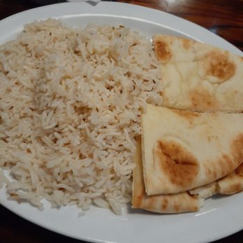 Highway Host - a plate of food with rice and pita bread - Canadian (New) Near Me - Rosetown, Saskatchewan