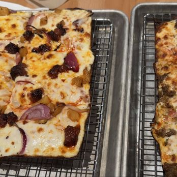 Porano - Spicy sausage Detroit style pizza on left and meatball pizza on right. Yum! - Pasta Shops Near Me - Des Peres, Missouri Porano - Spicy sausage Detroit style pizza on left and meatball pizza on right. Yum! - Pasta Shops Near Me - Des Peres, Missouri