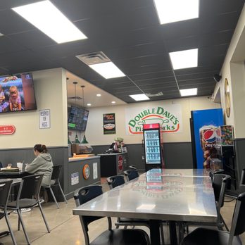 DoubleDave's Pizzaworks - a restaurant with tables and chairs - Pizza Near Me - Lubbock, Texas
