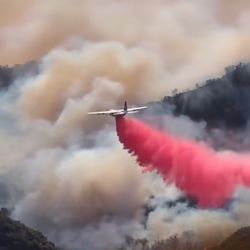 Beverly Hills Fire Department Headquarters Station 1 - Phos-chek from airplanes helps to quell the fires - 1/11/2025