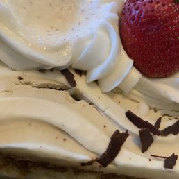 Weird combination of sugar Frosting on a Tiramisu ? Nasty , stick with the recipes