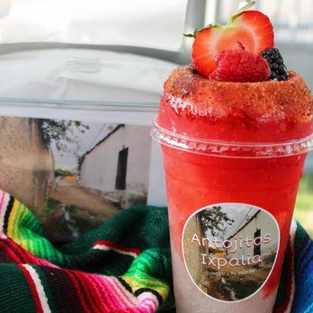 Antojitos Ixpalia - strawberries in a cup - Food Stands Near Me - Bakersfield, California