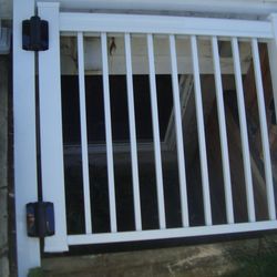 Atkins Foundation Services - This is a gate on our egress window that Sean built for us. Keeps the racoons out of the window well.