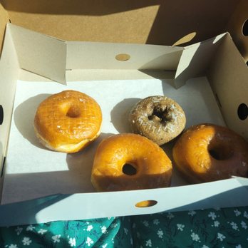 Randy's Donuts - 3 glazed and a blueberry in a giant wasteful box - Donuts Near Me - Burbank, California Randy's Donuts - 3 glazed and a blueberry in a giant wasteful box - Donuts Near Me - Burbank, California
