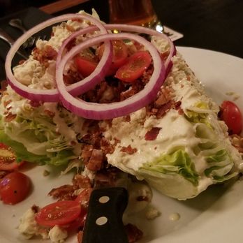 Pub Republic - Iceberg Wedge Salad: Iceberg Lettuce, Crumbled Bacon, Cherry Tomato, Shaved Red Onion, House-Made Pt. Reyes Blue Cheese Dressing ($11.50) - Gastropubs Near Me - Petaluma, California