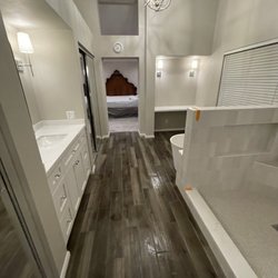 Jm Custom Tile and Stone - Master bathroom with porcelain planks for bathroom floor tile from MSI