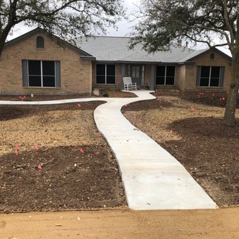 Ace Contractors - Flowing, creative solution to our sidewalk needs. - Masonry/Concrete Near Me