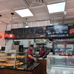 Lucia Pizza - Menu and counter