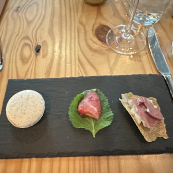 Emmer & Rye - 1. macaroon with pork liver mousse 2. strawberry dipped in pork fat 3. pork heart with sauerkraut - Tapas/Small Plates Near Me - Austin, Texas