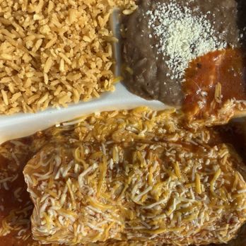 Miny's Mexican Restaurant - Wet Veggie Burrito Comes with Beans and rice. Inside burrito is large lightly cooked strips of bell pepper and onions. - Tacos Near Me - Ypsilanti, Michigan
