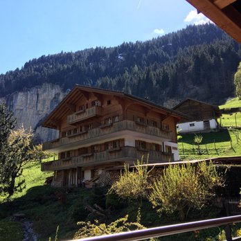 Hotel Silberhorn - Alternate view on a sunny day, cute little goat family lives up at the half-white building! Hearing their bells is so idyllic. - Hotels Near Me - Lauterbrunnen, BE Hotel Silberhorn - Alternate view on a sunny day, cute little goat family lives up at the half-white building! Hearing their bells is so idyllic. - Hotels Near Me - Lauterbrunnen, BE