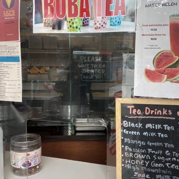 Lily's Creperie - a menu displayed in a window - Juice Bars & Smoothies Near Me - San Mateo, California
