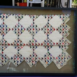 Village Art Center - Antique silk quilt is now safe and appreciated all day long.