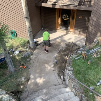 T&T Property Maintenance - Compacting base material for a flagstone walkway - Landscape Architects or Designers Near Me T&T Property Maintenance - Compacting base material for a flagstone walkway - Landscape Architects or Designers Near Me