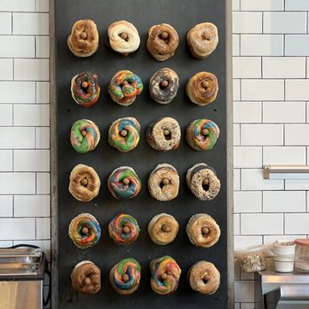 Eltana - a display of doughnuts on a baking sheet - Coffee & Tea Near Me - Seattle, Washington