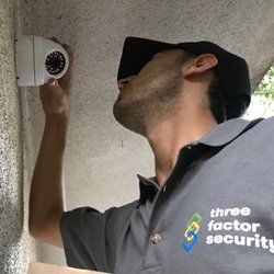 Three Factor Security Cameras Installation - Professional Installer getting the perfect angle on a Dome security camera installation at a lovely location in Malibu, California