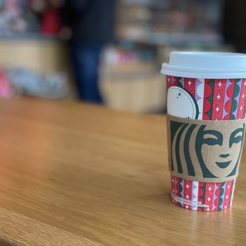 Starbucks - a cup of coffee on a table - Coffee & Tea Near Me - Goodlettsville, Tennessee