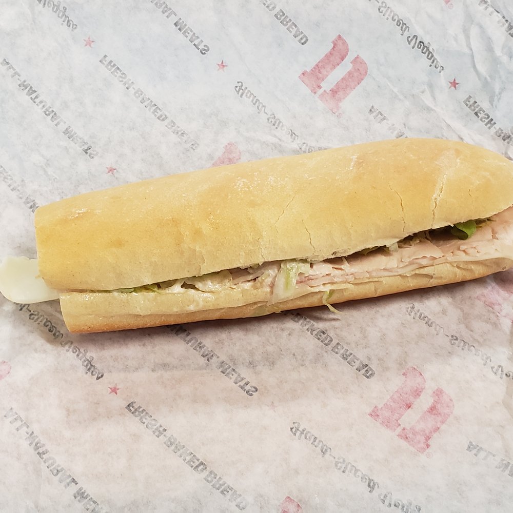 a sub sandwich on a wrapper