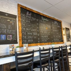 The Rustic Sandwich Deli - Menu board & seating