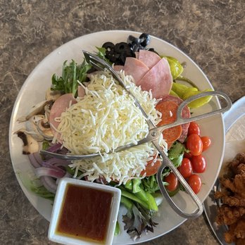 Guido’s At the Hangar - "Small" antipasto salad. Cheese mountain and meat all up in der! - Pizza Near Me - Rosamond, California