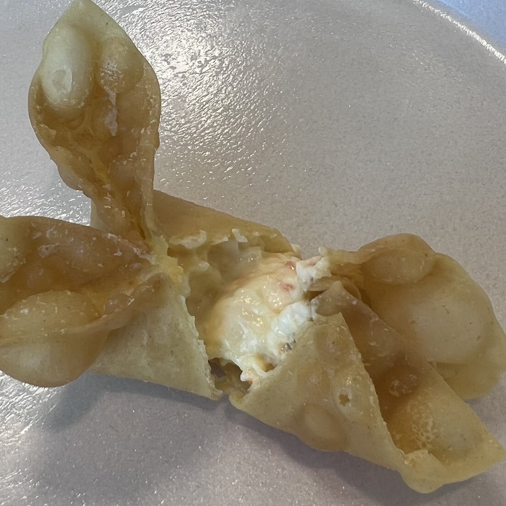 a piece of food on a plate a piece of food on a plate